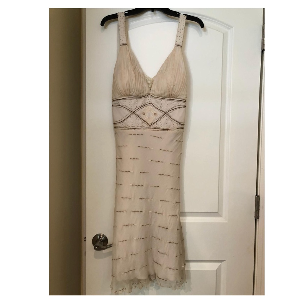 Creme dress with sewn in detail